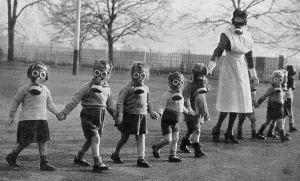 Girl Prints: Evacuee children in gas masks near Windsor, 1941