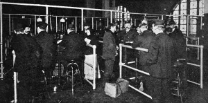 Examining Prints: Examining Passports at Ellis Island, New York, 1911