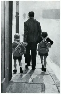 Parents Prints: A father leads his two children to be evacuated 1939