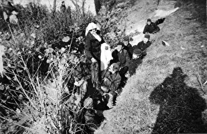 Visiting Prints: During the fierce fighting near Dixmude: A Belgian Red Cross nurse visiting Belgian soldiers in the trenches