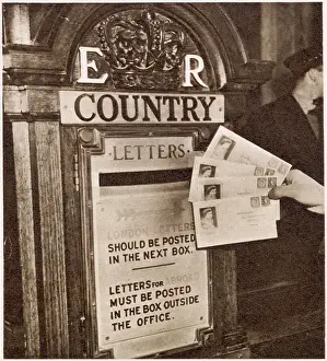 Issue Prints: Some of the first letters to bear the stamps of the new reign of Queen Elizabeth II being posted at the General Post