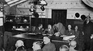 Britain Prints: The foreman of the jury conferring with the Coroner in Sutton village hall where a