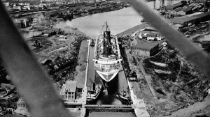 May Prints: The French Liner Normandie in dock at St. Nazaire