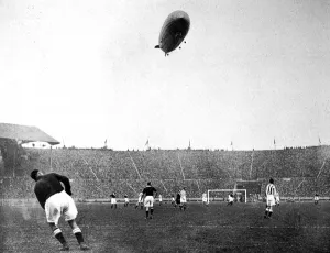Spectators Prints: The Graf Zeppelin over Wembley during the F. A. Cup Final
