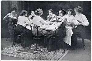 20th Prints: A group of society ladies enjoying a cup of tea and biscuits together. Date: 1910