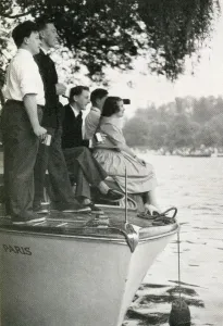 Commissioner Prints: Group watching the Henley Regatta from boat, July 1958