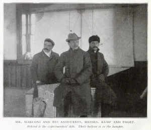 Communications Prints: Guglielmo Marconi with his Assistants Kemp and Paget, behind is the experiments kite