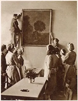 Public Prints: Hanging a painting of a romantic landscape in the new Churchill British Restaurant in