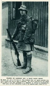 Waterproof Prints: Highlander wearing rainproof hat 1915