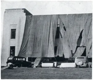 Precautions Prints: Huge blinds used to camouflage a factory, Sept 1939