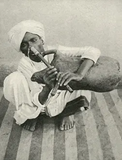 Unusual Prints: Indian musician plays noseflute and bagpipes simultaneously