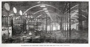 Exterior Prints: Interior view of under three spans of roof of Prices Candle Company