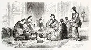 Floor Prints: Japanese people sitting on the floor eating their meal using small bowls and chopsticks