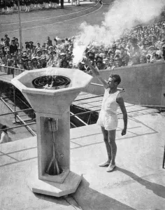 Mark Prints: John Mark lights the Olympic bowl, opening ceremony, 1948