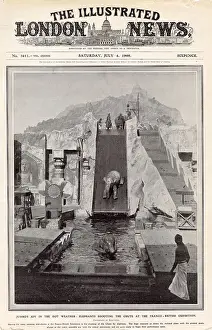 White Prints: Jumbo's joy in the hot weather: Elephants shooting the chute at the Franco-British Exhibition held at White City