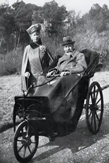 West Prints: King George V (1865-1936) with Queen Mary in a bath chair (made 40 years previously for Queen Victoria)