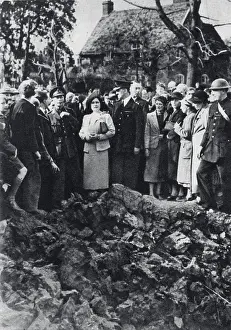 1940 Prints: King George VI and Queen Elizabeth watching an air battle while visiting bombed areas in London