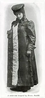 Winter Prints: Lady motorist wearing a quilted full length protective motor-coat against the bad weather designed by Dunhill