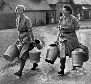Carry Prints: Land Army Girls carry milk pails, 1939