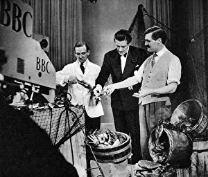 1949 Prints: Leslie Mitchell learns about oysters. A Picture Page broad