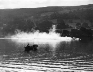 1947 Prints: Malcolm Campbell making trial run on Coniston Water, 1947