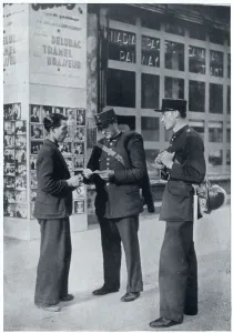 Paris Prints: Man shows identity papers to gendarmes, September 1939