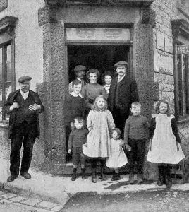 December Prints: The Marchington Family outside the Post Office in Dove Holes