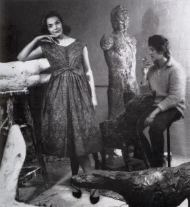 Cigarette Prints: Model wearing a cotton dress by Sambo, visits Elisabeth Frink, the sculptor in her studio
