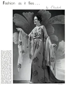 Frocks Prints: Model wearing a floral maternity evening gown 1937