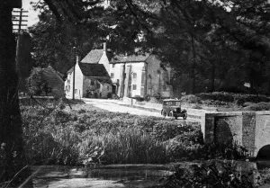 Driving Prints: Morris Minor driving through English village