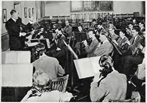 Public Prints: Mr Allen conducting the school orchestra in the Music School at Wellington College