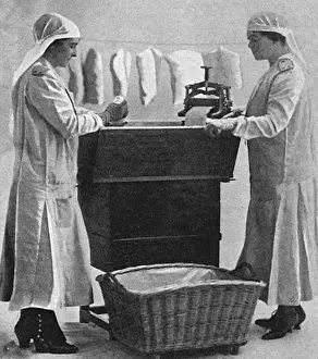 Mason Prints: Mrs Lawrence & Mrs Mason carbonising garments for troops, WW1