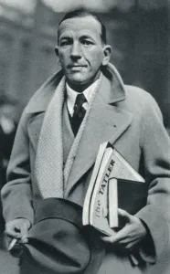 Coward Prints: Noel Coward carrying The Tatler