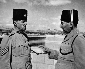Prints of Photograph showing an Arab Drill Sergeant (on left) and Officer of the Palestine Police Force at their barracks in Jerusalem, November 1945 October Prints: Officer and Sergeant of the Palestine Police Force, 1945