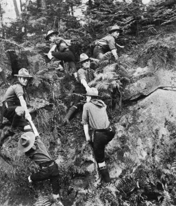 Scheme Prints: Patrol of boy scouts making its way across difficult country