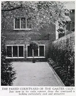 Early Prints: The Paved Courtyard of The Garter Club, the trees bedecked with early summer blossom