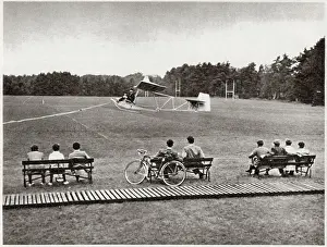 Public Prints: On one of the playing fields at Wellington College - a member of the Air Force section taking off in a glider