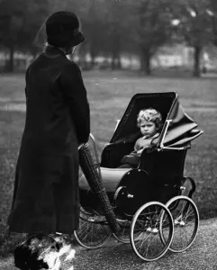 Queen Elizabeth II Prints: Queen Elizabeth in her pram aged three