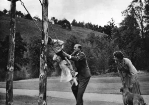 Anne Prints: The Queen and Prince Philip play with their children