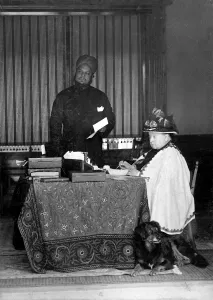 Prints of Photographic portrait of Queen Victoria (1819-1901) of Great Britain and Ireland and Empress of India, pictured at her writing desk, c.1890 November Prints: Queen Victoria and Abdul Karim, c. 1890