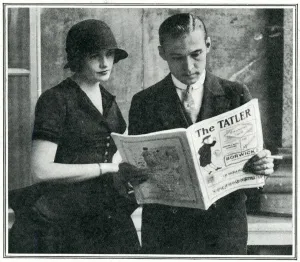 1923 Prints: Rudolph Valentino reading The Tatler