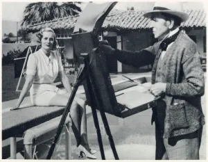 John Prints: Sir John Lavery at his easel in Palm Springs, painting Doris Delavigne, Lady Castlerosse