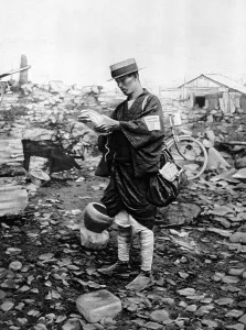 1923 Prints: Tokyo postman delivering letters to the rubble