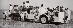Beach Prints: The tractor coach at Deauville takes children down to beach