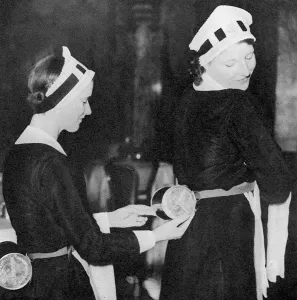 Restaurant Prints: Waitresses wearing gas masks, WWII