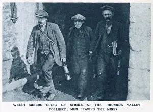 Wales Prints: Welsh miners going on strike at the Rhondda valley colliery: Men leaving the mines