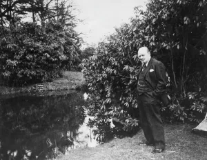 Fishing Prints: Winston Churchill by a lake at Chartwell