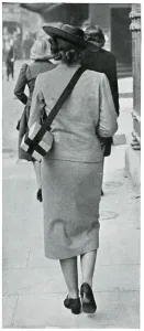 Carry Prints: Woman carrying gas mask correctly, September 1939