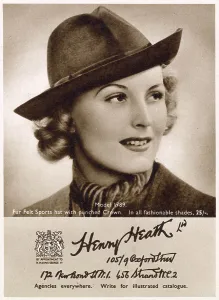 Felt Prints: Woman wearing felt homburg hat. Date: 1940
