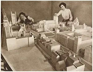 Works Prints: Working on a scale model of part of the Coronation route in a Ministry of Works office - looking down over Whitehall to